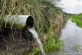 Drainage pipe discharging into waterway